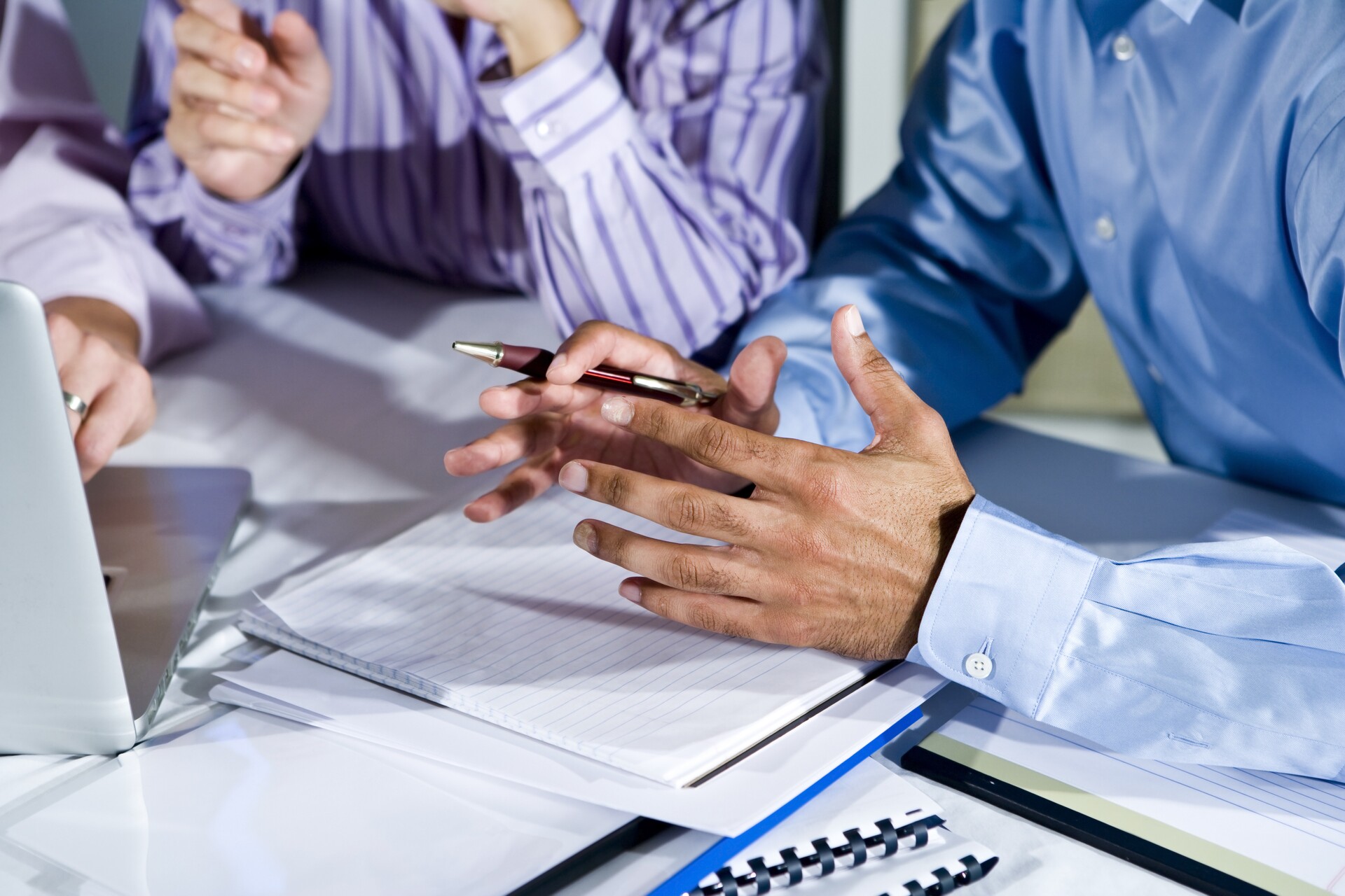 Three Office Workers Working Together On Project Shutterstock 66193621 1920 Photo Shutterstock